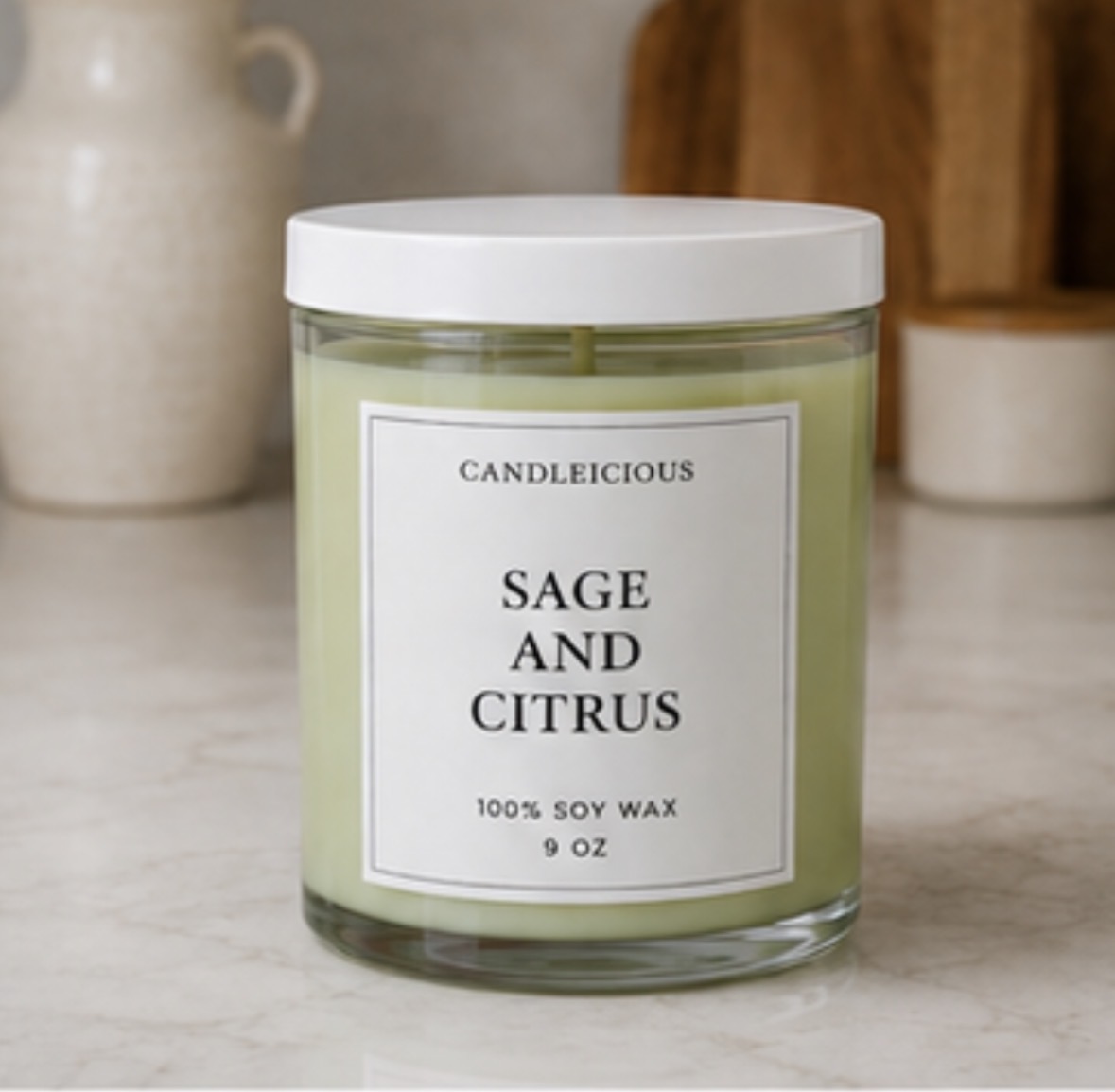 Sage and Citrus 9 oz soy candle in a clear glass jar with white lid
